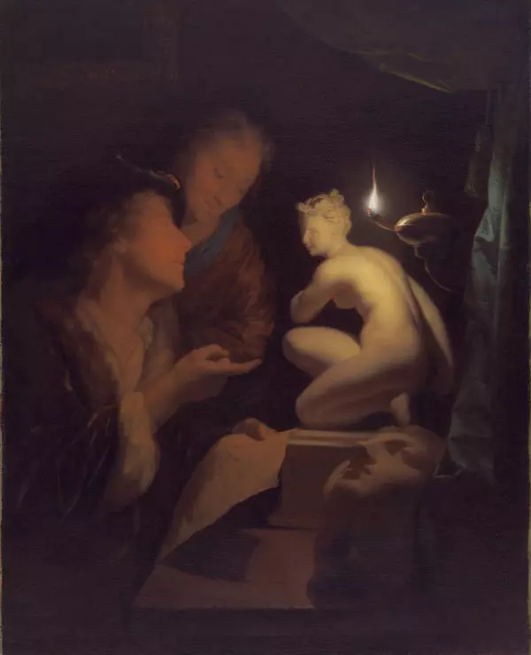 Юноша и девушка, разглядывающие статую Венеры