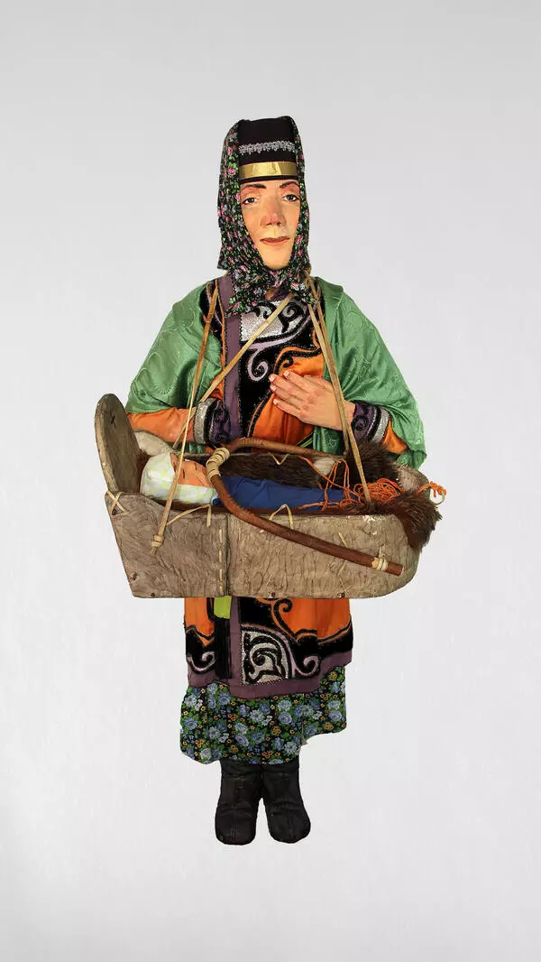 Selkup woman with a child