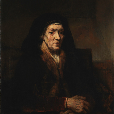 Портрет сидящей женщины со скрещенными руками