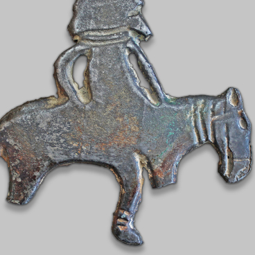 Flat casting in the form of a horseman