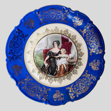 A souvenir plate with a woman's portrait 