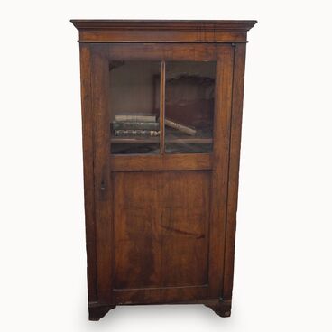 Cabinet with a glazed door