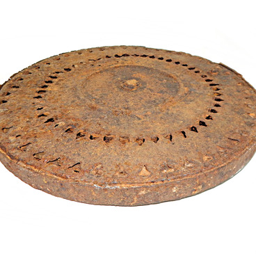 A disk magazine from a Degtyarev machine gun