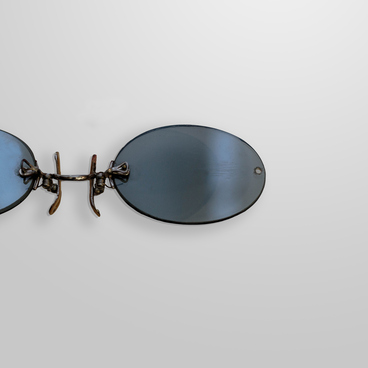 Pince-nez with oval smoke-colored lenses